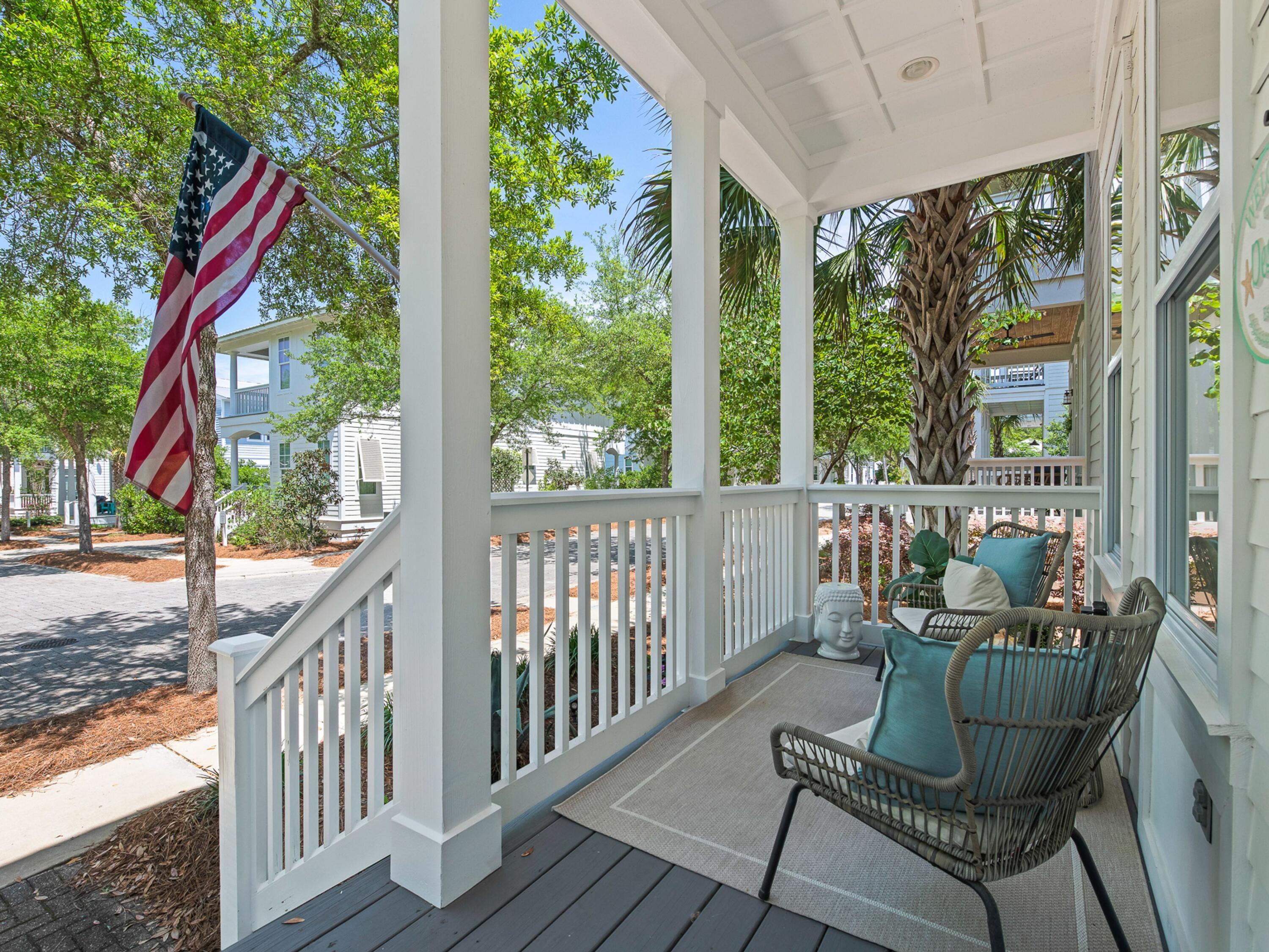 37 Dune Ridge Road Santa Rosa Beach, FL 32459 - Photo 5 of 40 a view of a chair and tables in the balcony