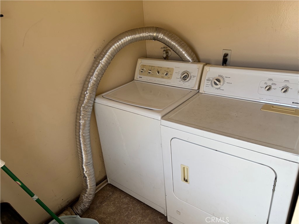 509 North Alameda Avenue Azusa, CA 91702 - Photo 11 of 11 a utility room with dryer and washer