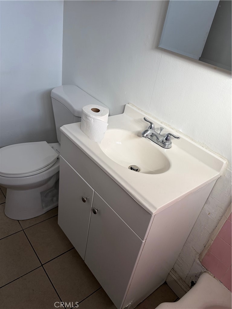 509 North Alameda Avenue Azusa, CA 91702 - Photo 2 of 11 a bathroom with a sink and a toilet