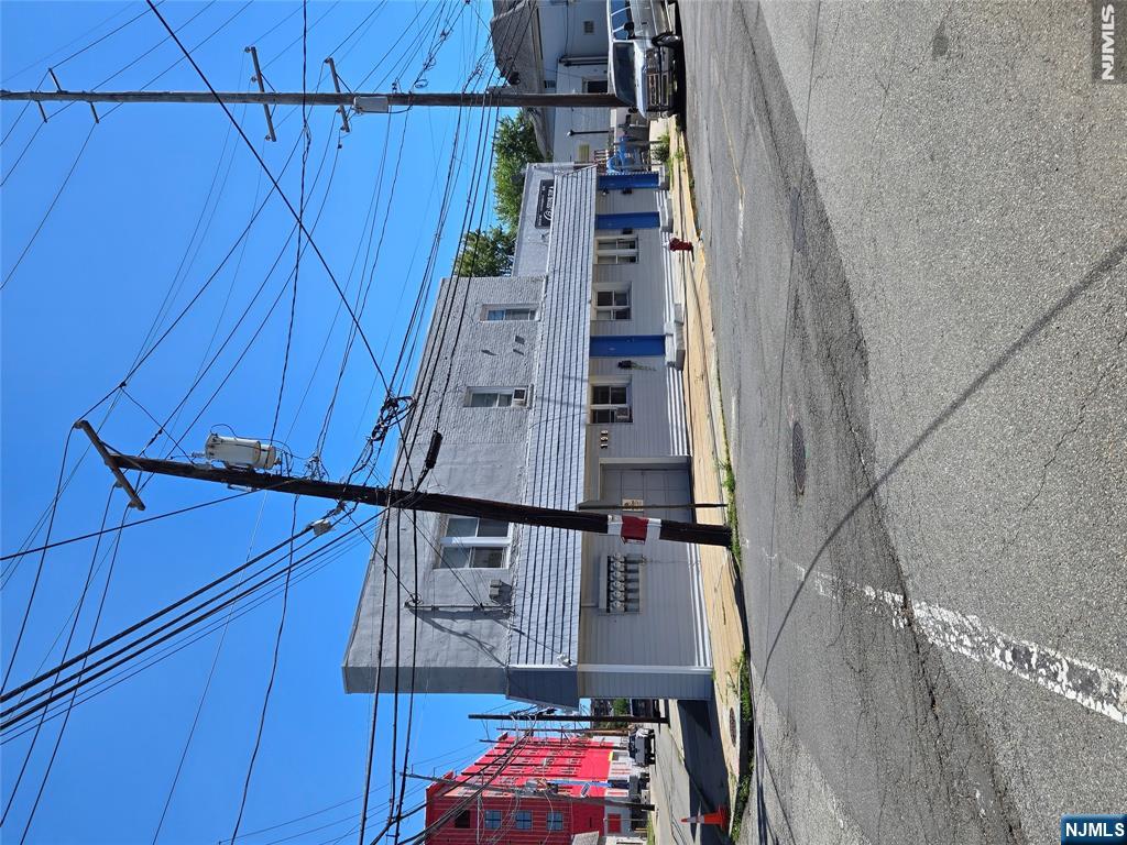 198 Kansas Street Hackensack, NJ 07601 - Photo 1 of 16 a view of a street