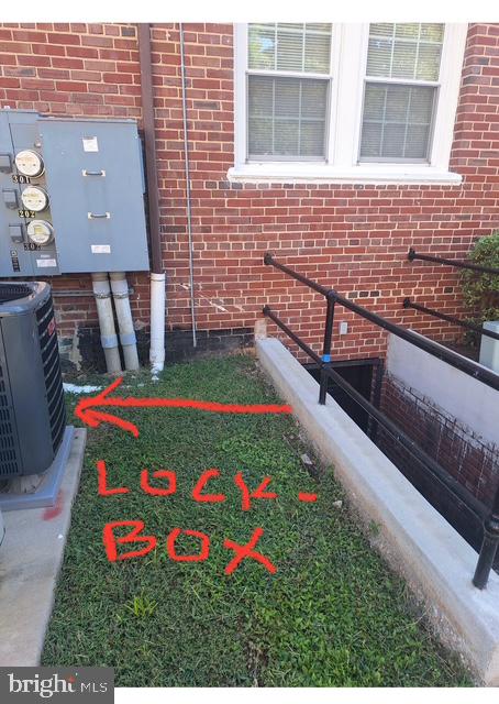 3810 V Street Southeast, Unit 301 Washington, DC 20020 - Photo 33 of 36 a front view of house with yard