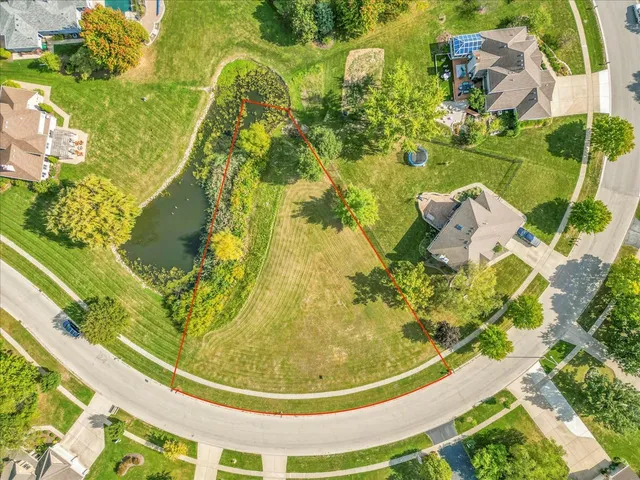a view of swimming pool from a balcony