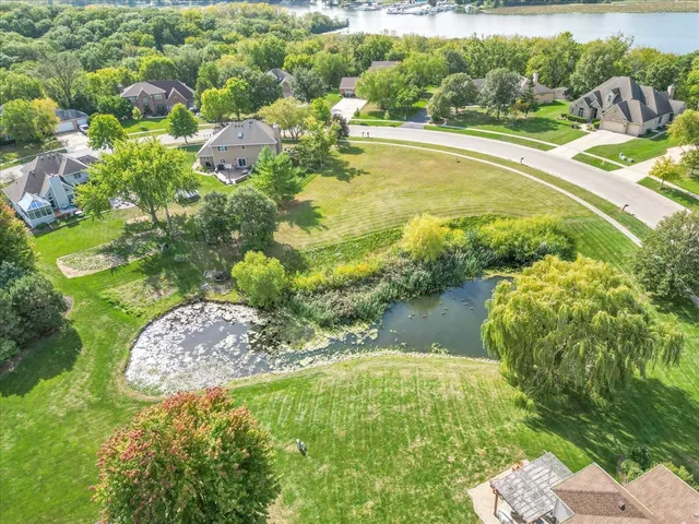 a view of a lake with a city