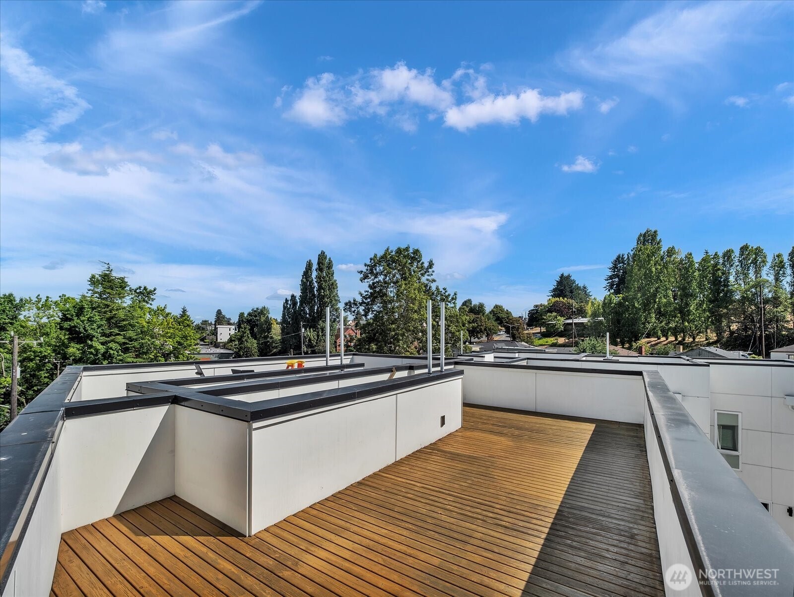 3628 14th Avenue South Seattle, WA 98144 - Photo 21 of 24 a view of a balcony with wooden floor and outdoor space