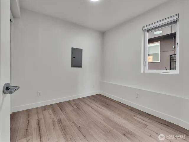 a view of a room that has a window in it