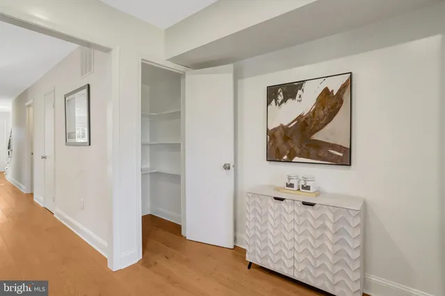 an entryway with a workspace