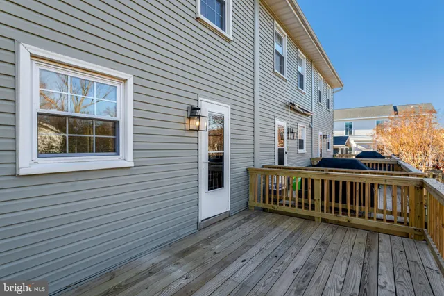 a bedroom with a bed and a table
