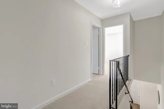 a view of water heater room with stairs