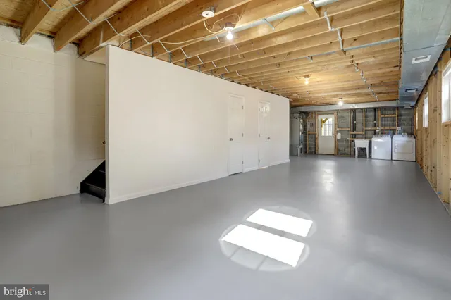 a view of a room with dryer and washer
