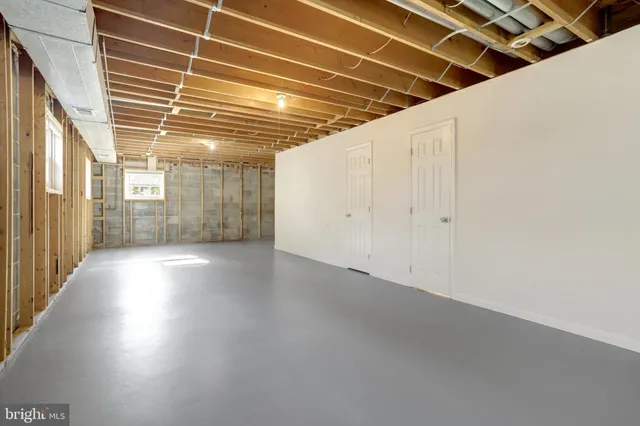a view of a shop with a lounge chairs