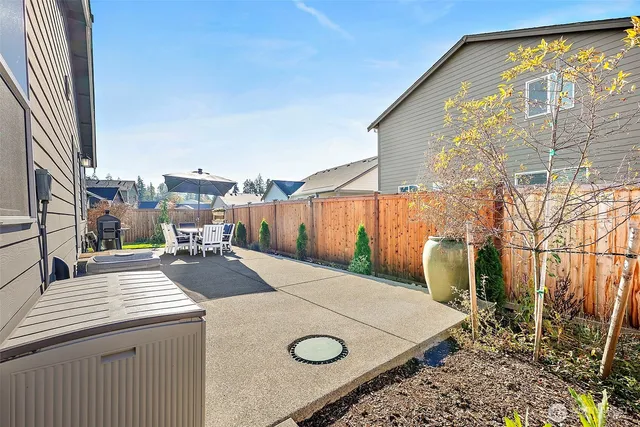 a view of a kitchen with a sink and living room