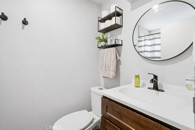a view of storage and utility room with washer and dryer