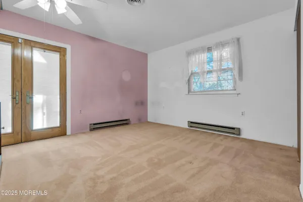 an empty room with windows