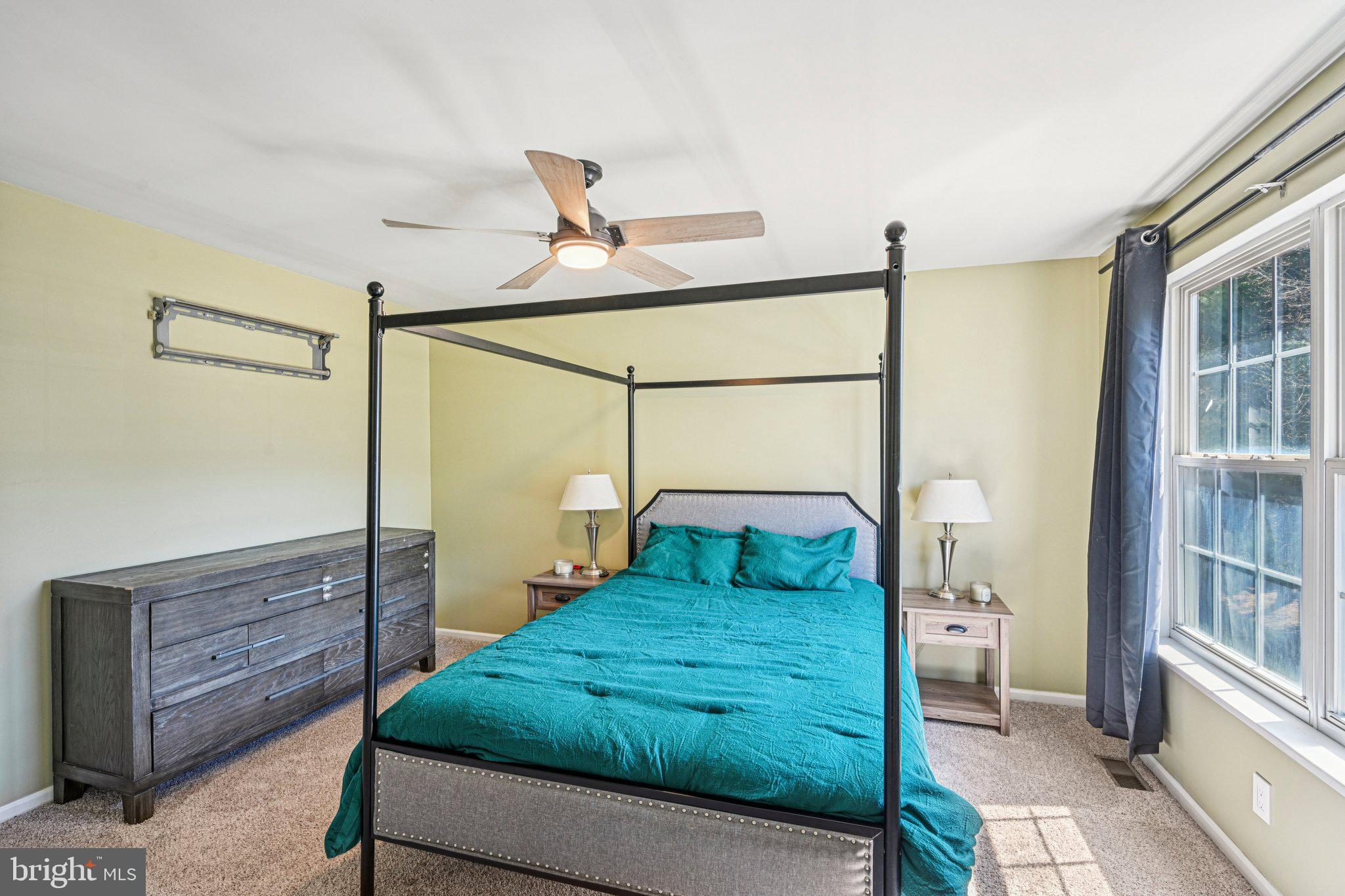 32 Millstream Road Pine Hill, NJ 08021 - Photo 19 of 36 a bedroom with a bed and a window