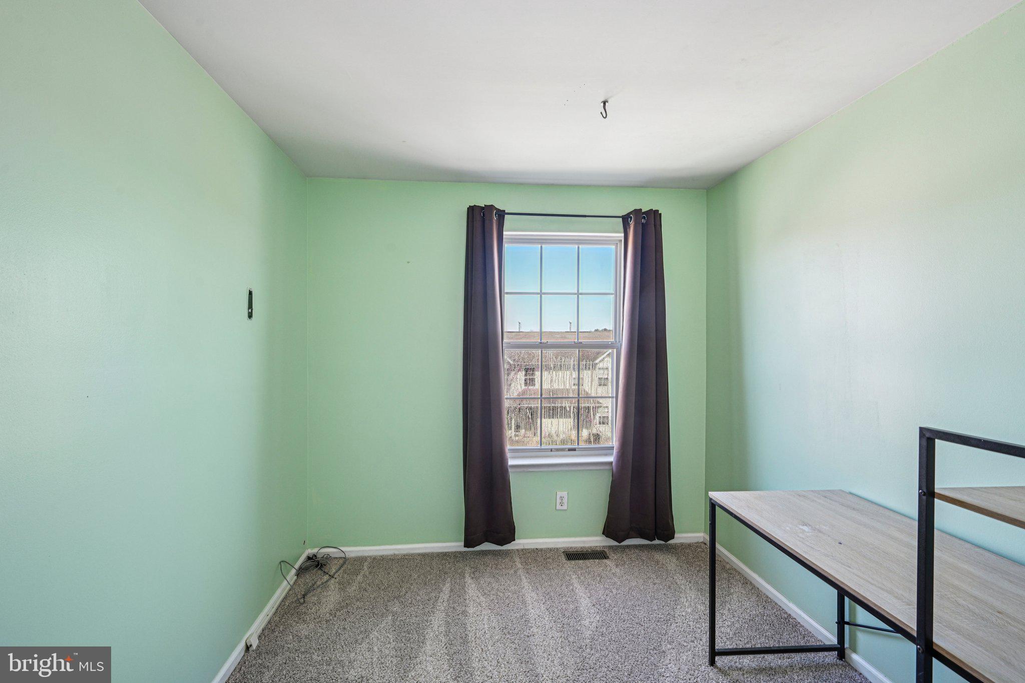 32 Millstream Road Pine Hill, NJ 08021 - Photo 23 of 36 a view of an empty room with a window