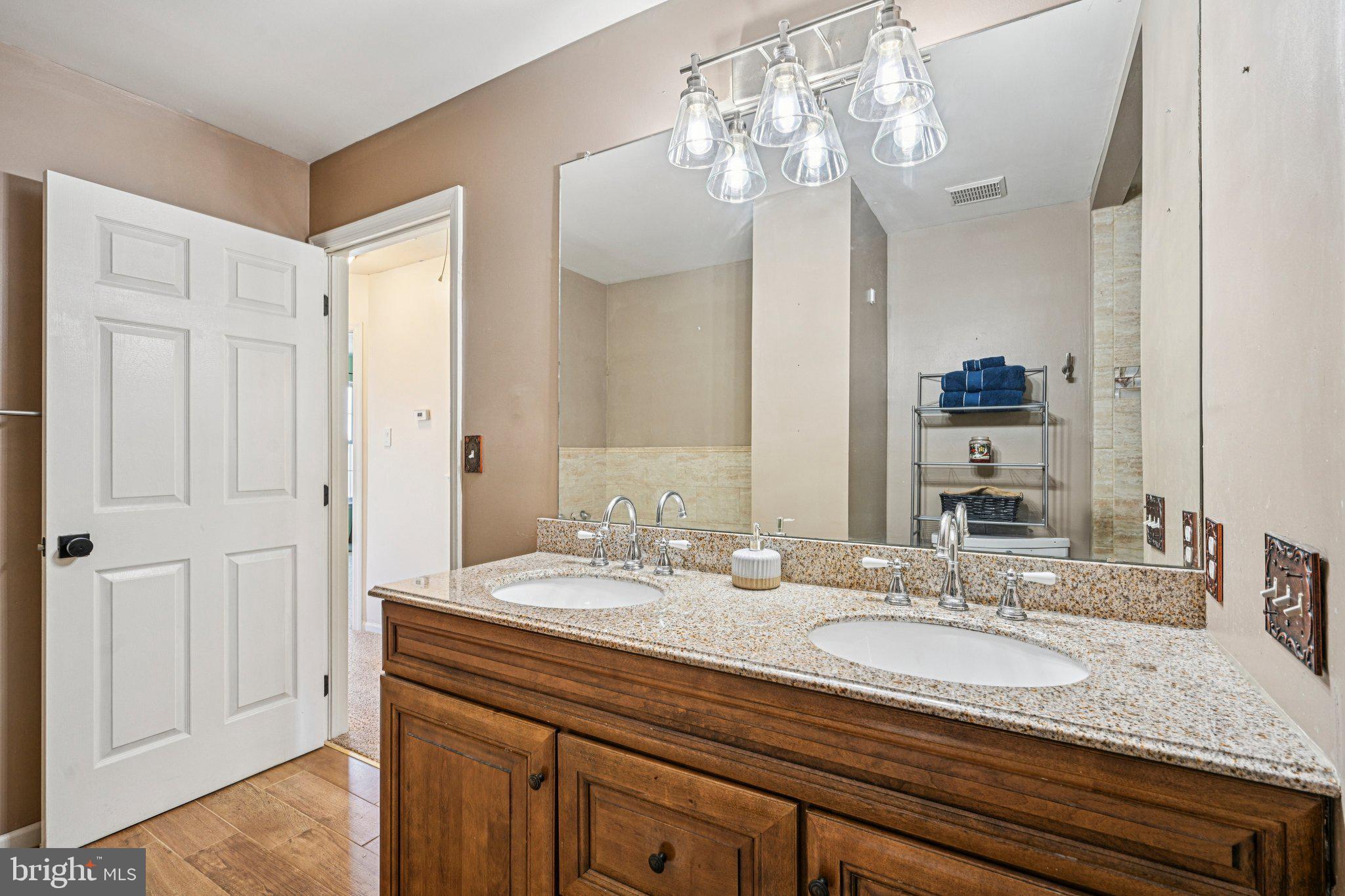 32 Millstream Road Pine Hill, NJ 08021 - Photo 27 of 36 a bathroom with a granite countertop double vanity sink and a mirror