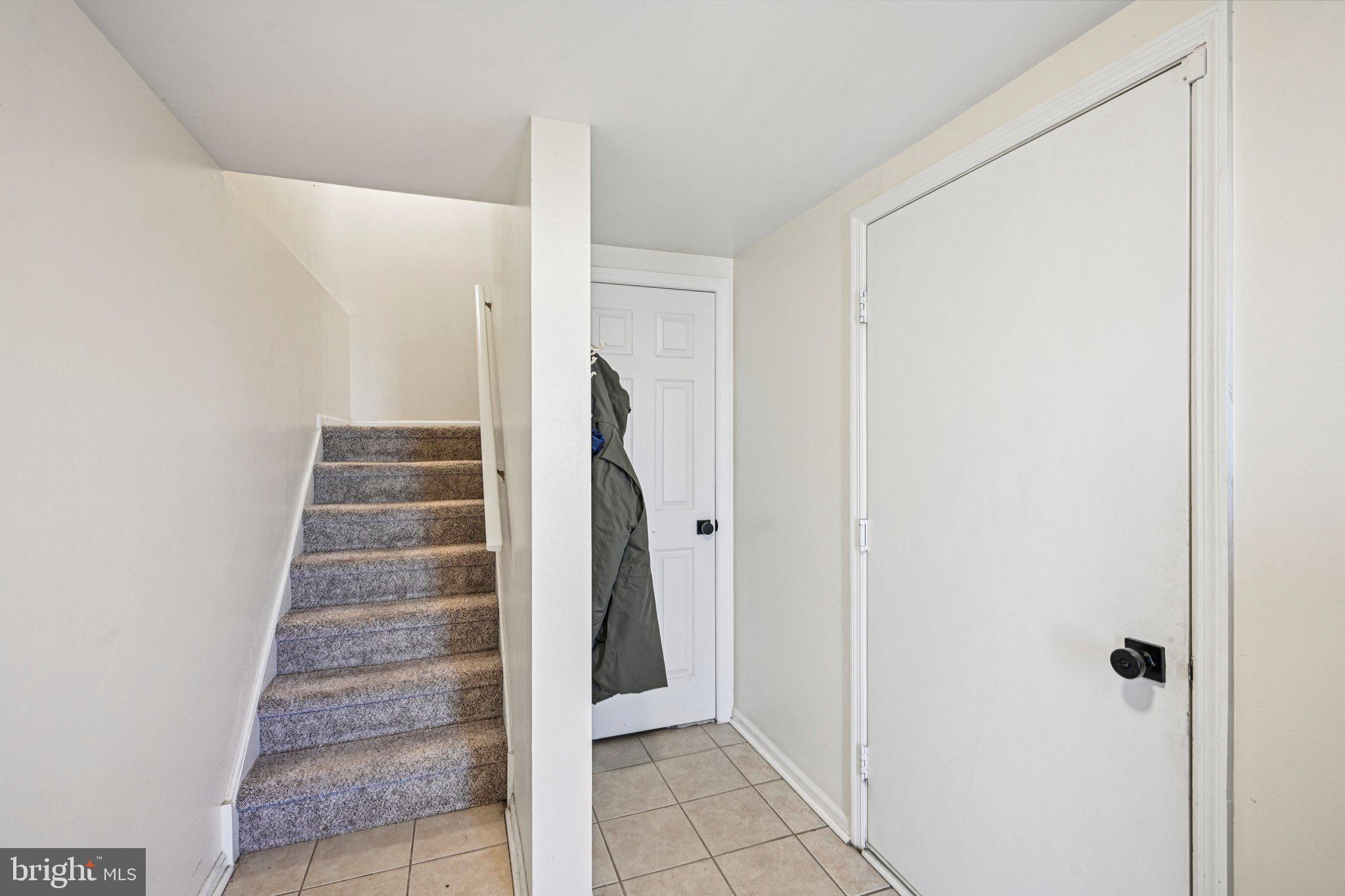 32 Millstream Road Pine Hill, NJ 08021 - Photo 6 of 36 a view of an entryway with staircase