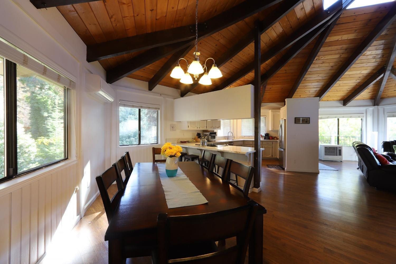 1870 Cable Road Camino, CA 95709 - Photo 20 of 36 a view of a dining room with furniture window and wooden floor
