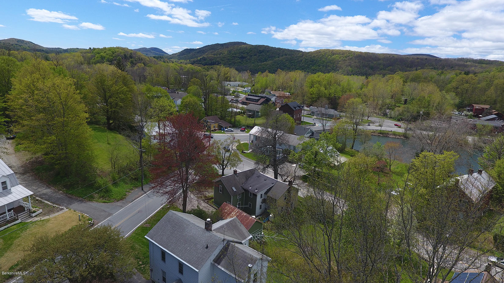 3 Lenox Road West Stockbridge, MA 01266 - Photo 2 of 20 a view of a lake with mountains in the background