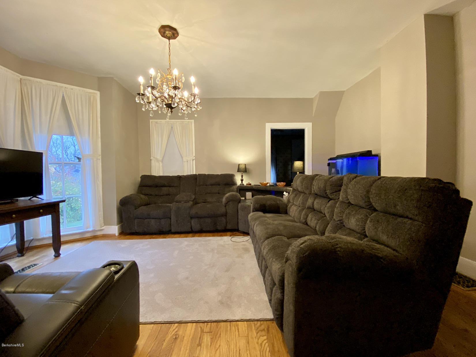 3 Lenox Road West Stockbridge, MA 01266 - Photo 8 of 20 a living room with furniture and a flat screen tv