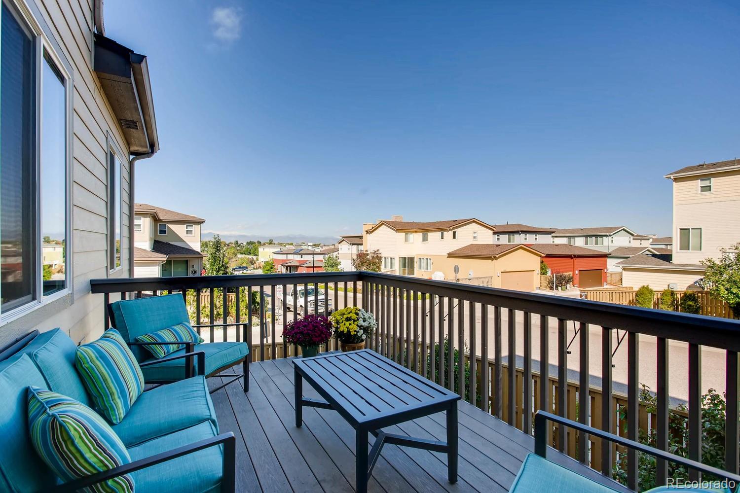 3435 Cranston Circle Highlands Ranch, CO 80126 - Photo 32 of 40 a view of balcony with wooden floor and seating space