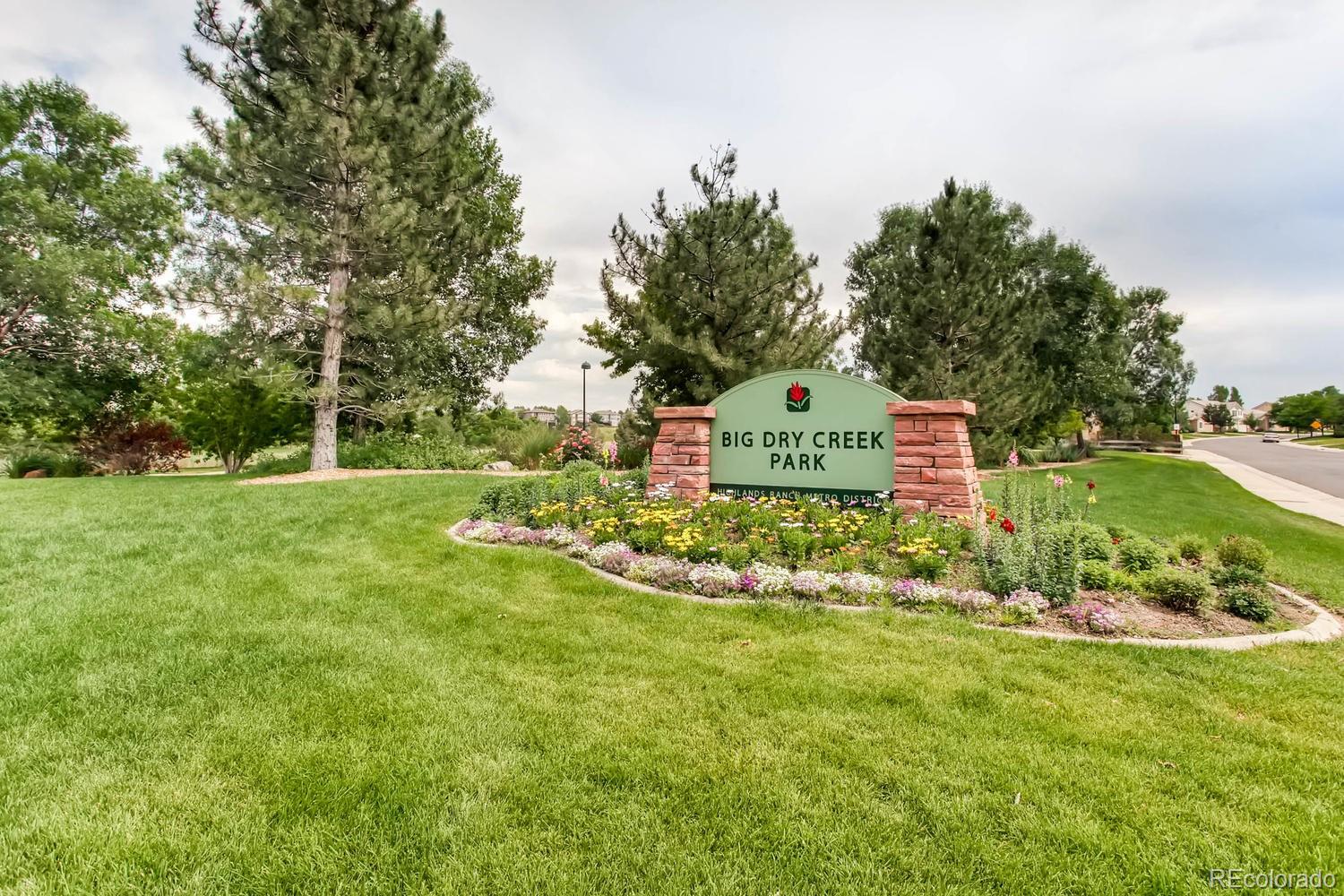 3435 Cranston Circle Highlands Ranch, CO 80126 - Photo 40 of 40 a sign board with grassy field