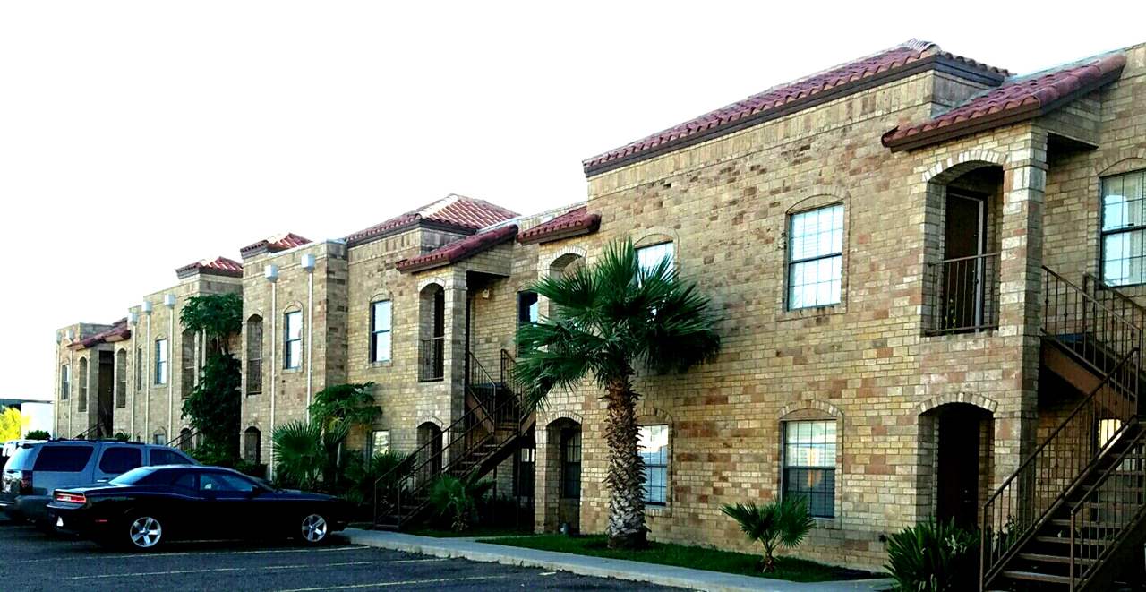 1207 Hillside Road, Unit 10 Laredo, TX 78041 - Photo 1 of 7 a view of a house with a cars park side of a road
