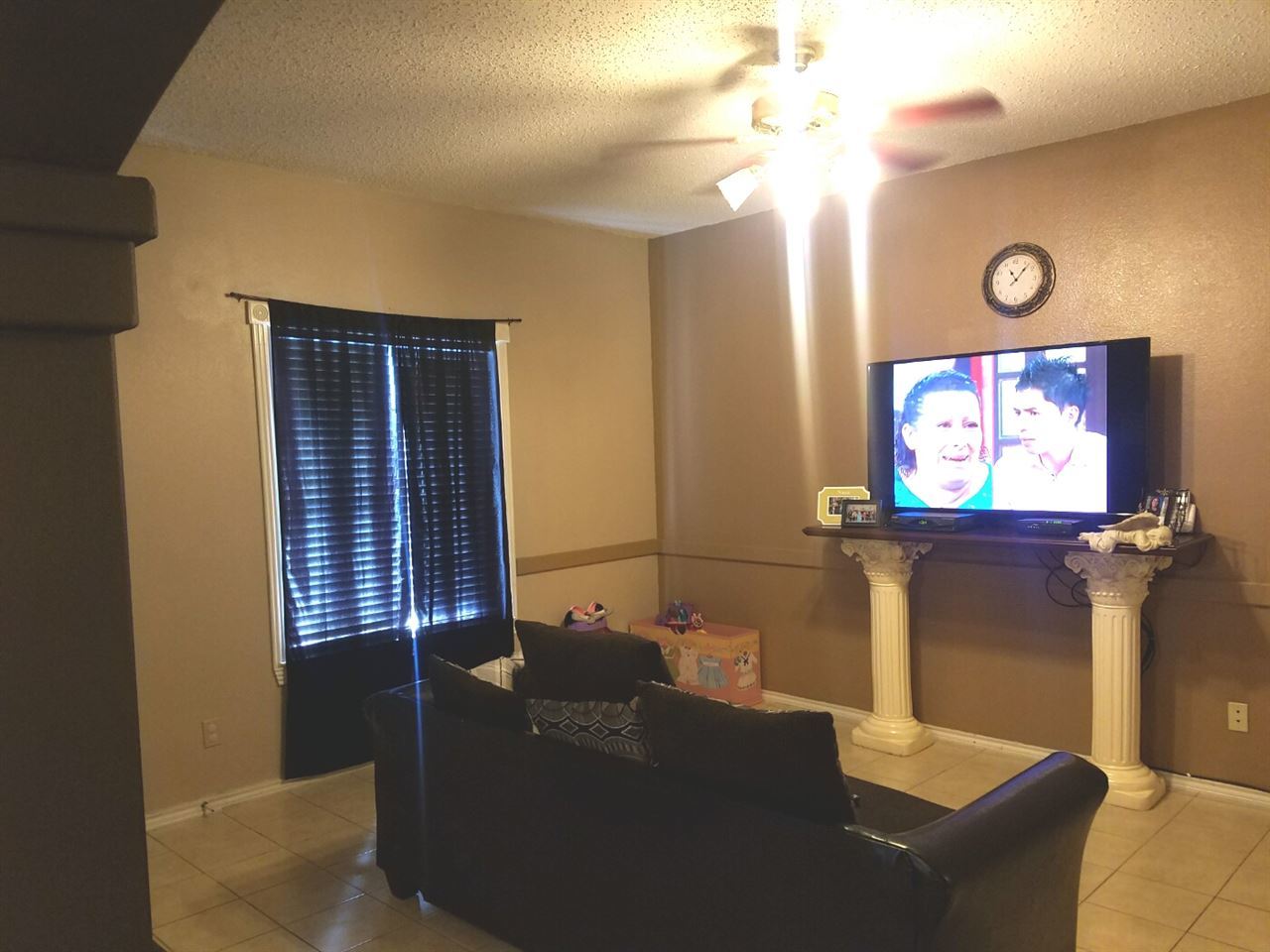 1207 Hillside Road, Unit 10 Laredo, TX 78041 - Photo 5 of 7 a living room with furniture and a flat screen tv