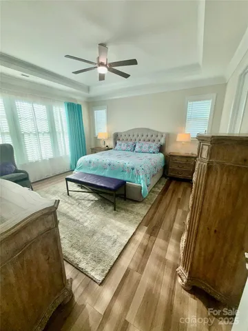 a bedroom with a bed furniture and a window