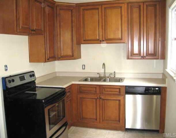 2320 Stevens Road Raleigh, NC 27610 - Photo 2 of 10 Spacious kitchen with all new maple cabinets, stainless steel appliances, fixtures, & tile floor Other
