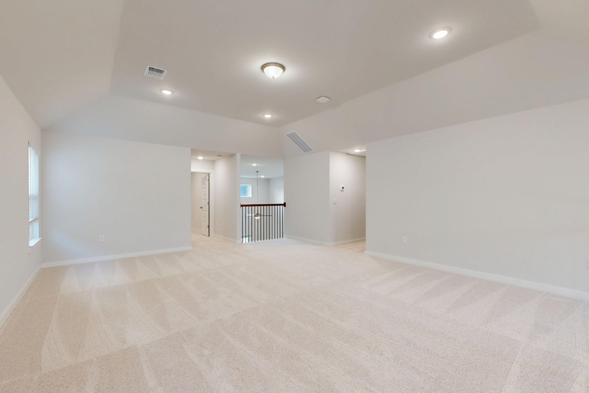 2029 Billings Way Leander, TX 78641 - Photo 20 of 29 a view of empty room with kitchen and window