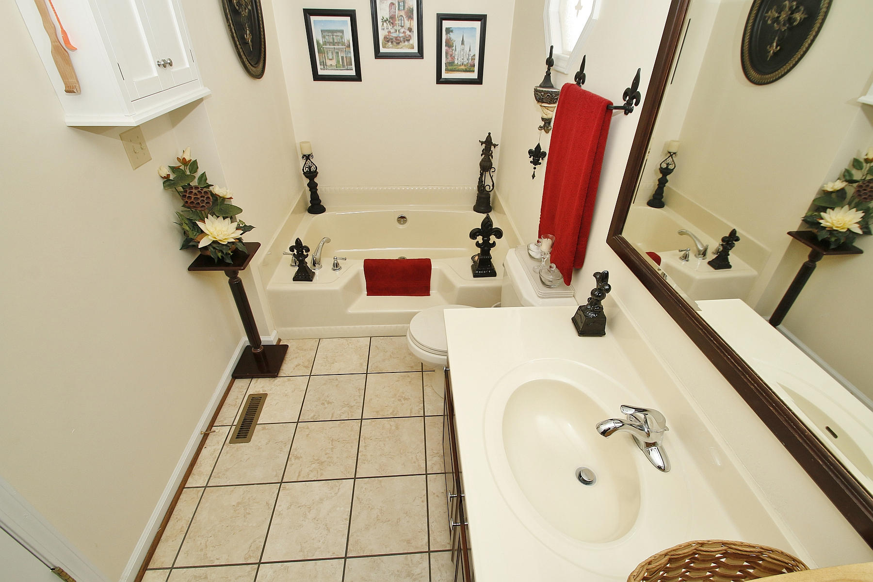 1883 Mill Iron Road Goodview, VA 24095 - Photo 21 of 56 a bathroom with a tub sink and mirror