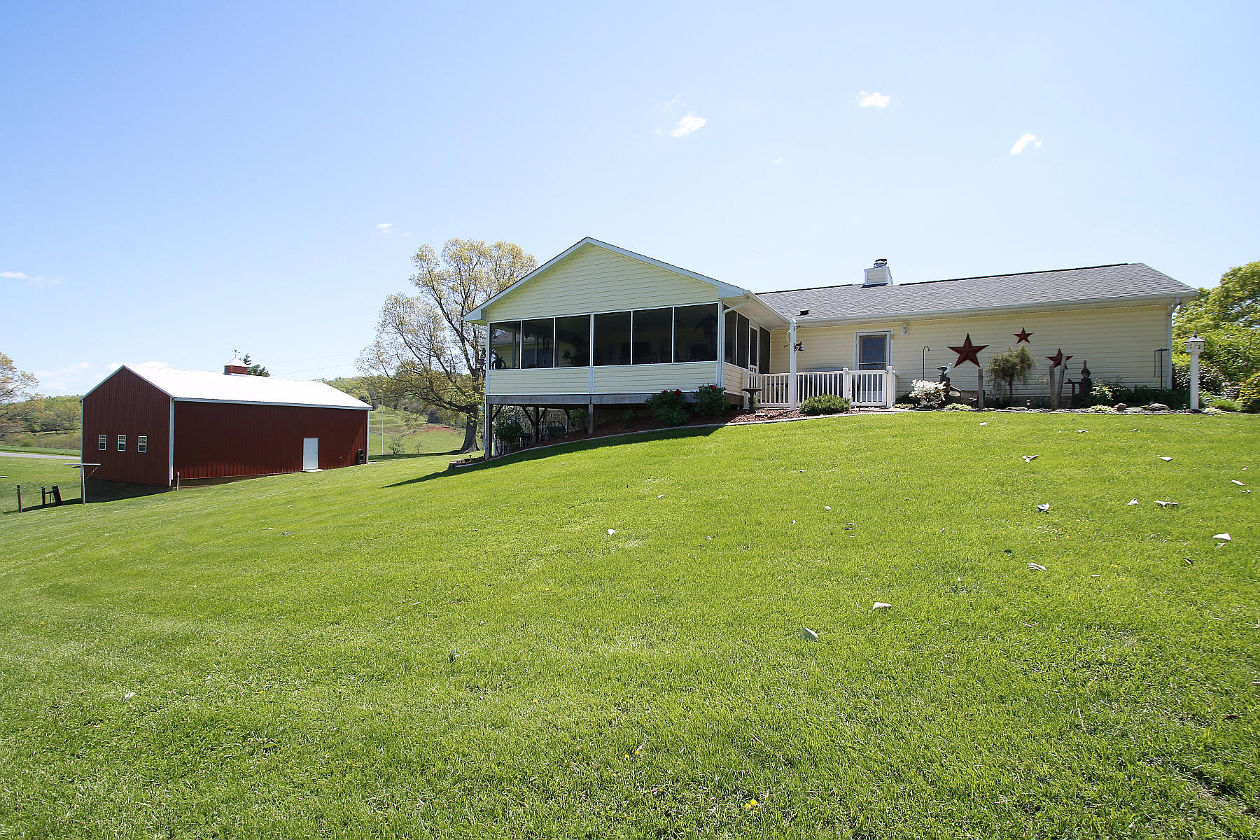 1883 Mill Iron Road Goodview, VA 24095 - Photo 50 of 56 a house view with a sitting space and garden