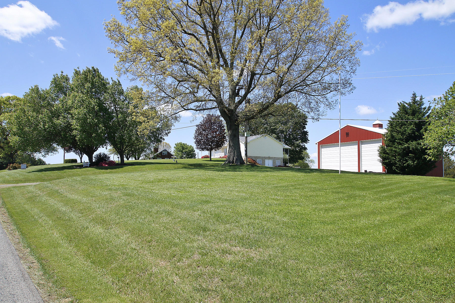 1883 Mill Iron Road Goodview, VA 24095 - Photo 56 of 56 a front view of a house with garden