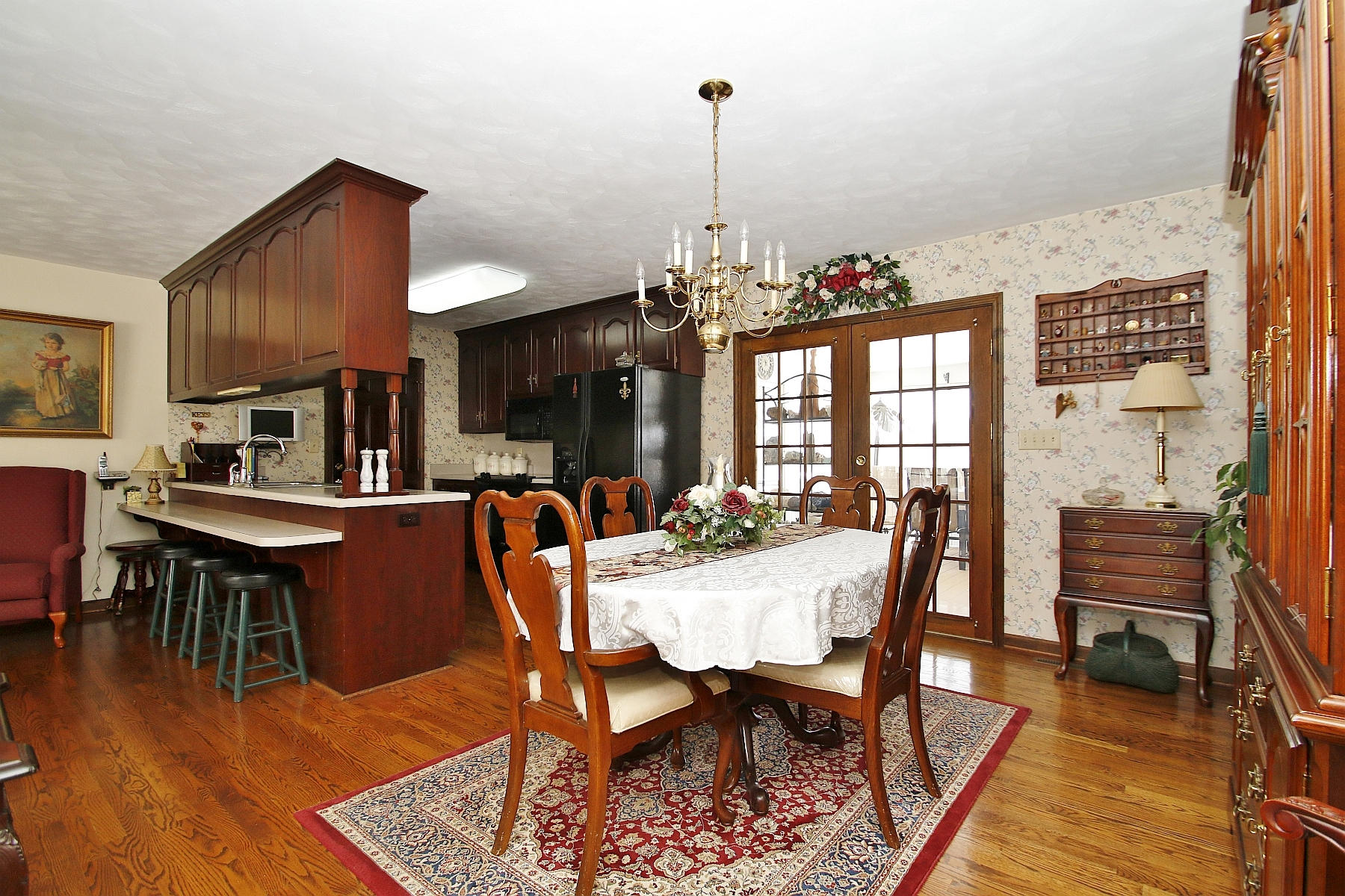 1883 Mill Iron Road Goodview, VA 24095 - Photo 8 of 56 a view of a dining room with furniture window and wooden floor