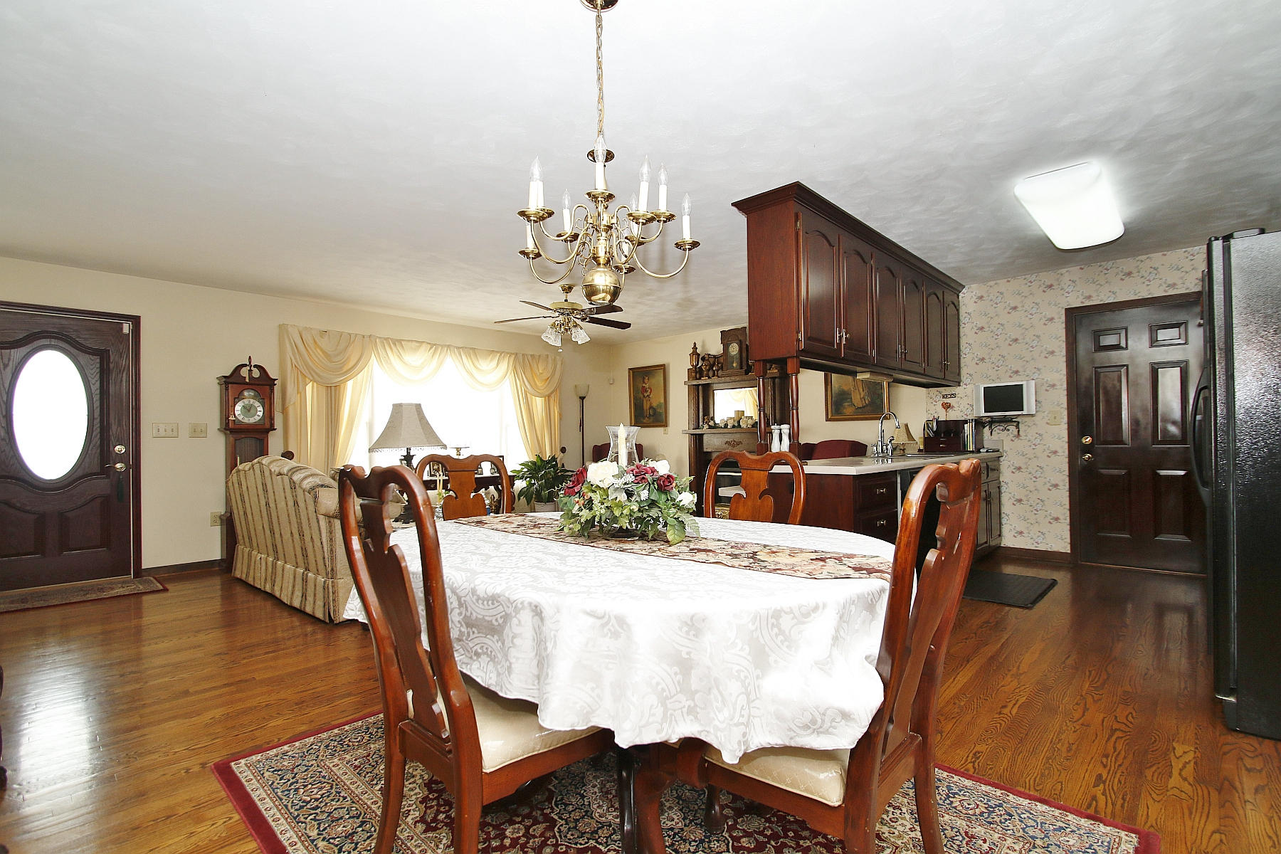 1883 Mill Iron Road Goodview, VA 24095 - Photo 9 of 56 a view of a dining room with furniture window and wooden floor