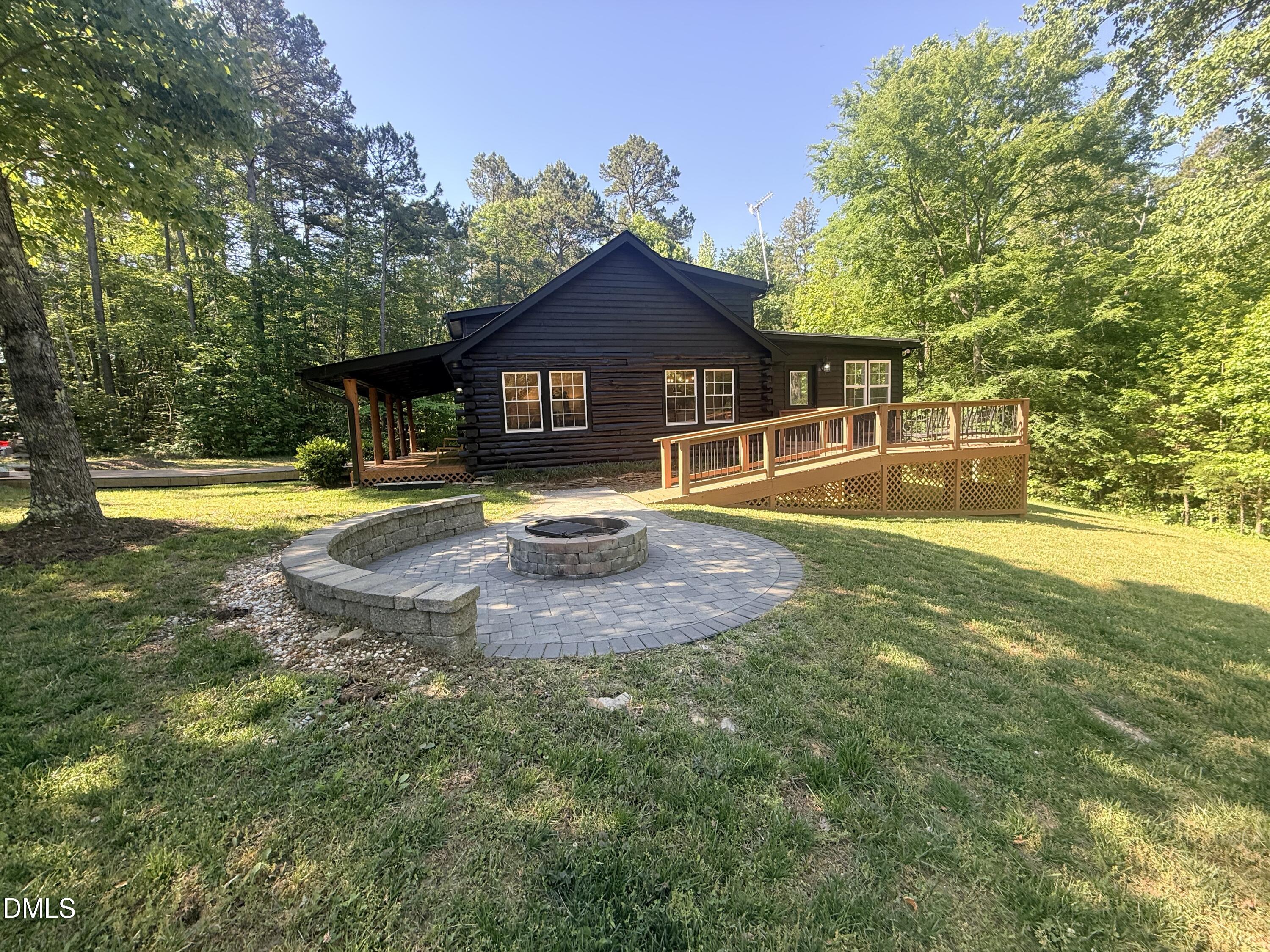327 Shady Oak Road Roxboro, NC 27574 - Photo 52 of 62 a view of a house with swimming pool and a yard