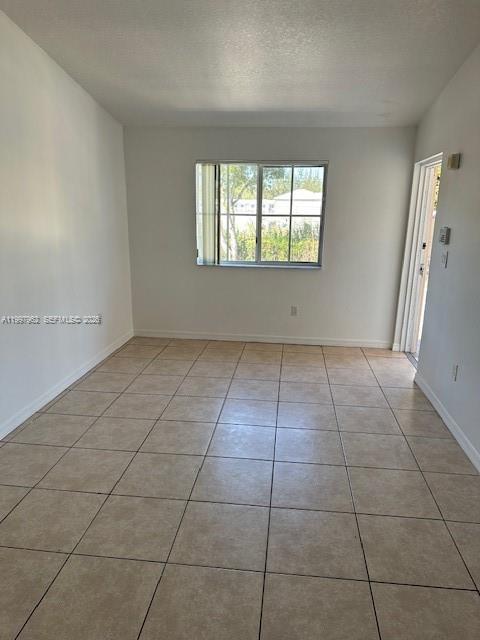 2931 Southeast 12th Road, Unit 20355 Homestead, FL 33035 - Photo 2 of 10 a view of an empty room with a window