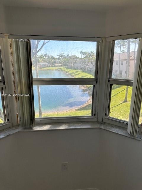 2931 Southeast 12th Road, Unit 20355 Homestead, FL 33035 - Photo 4 of 10 a view of a large window with a swimming pool