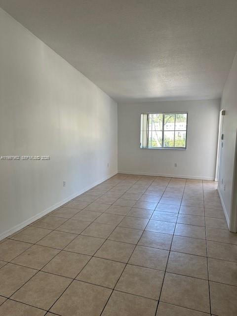 2931 Southeast 12th Road, Unit 20355 Homestead, FL 33035 - Photo 5 of 10 an empty room with windows
