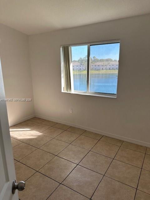 2931 Southeast 12th Road, Unit 20355 Homestead, FL 33035 - Photo 8 of 10 a view of an empty room with a window