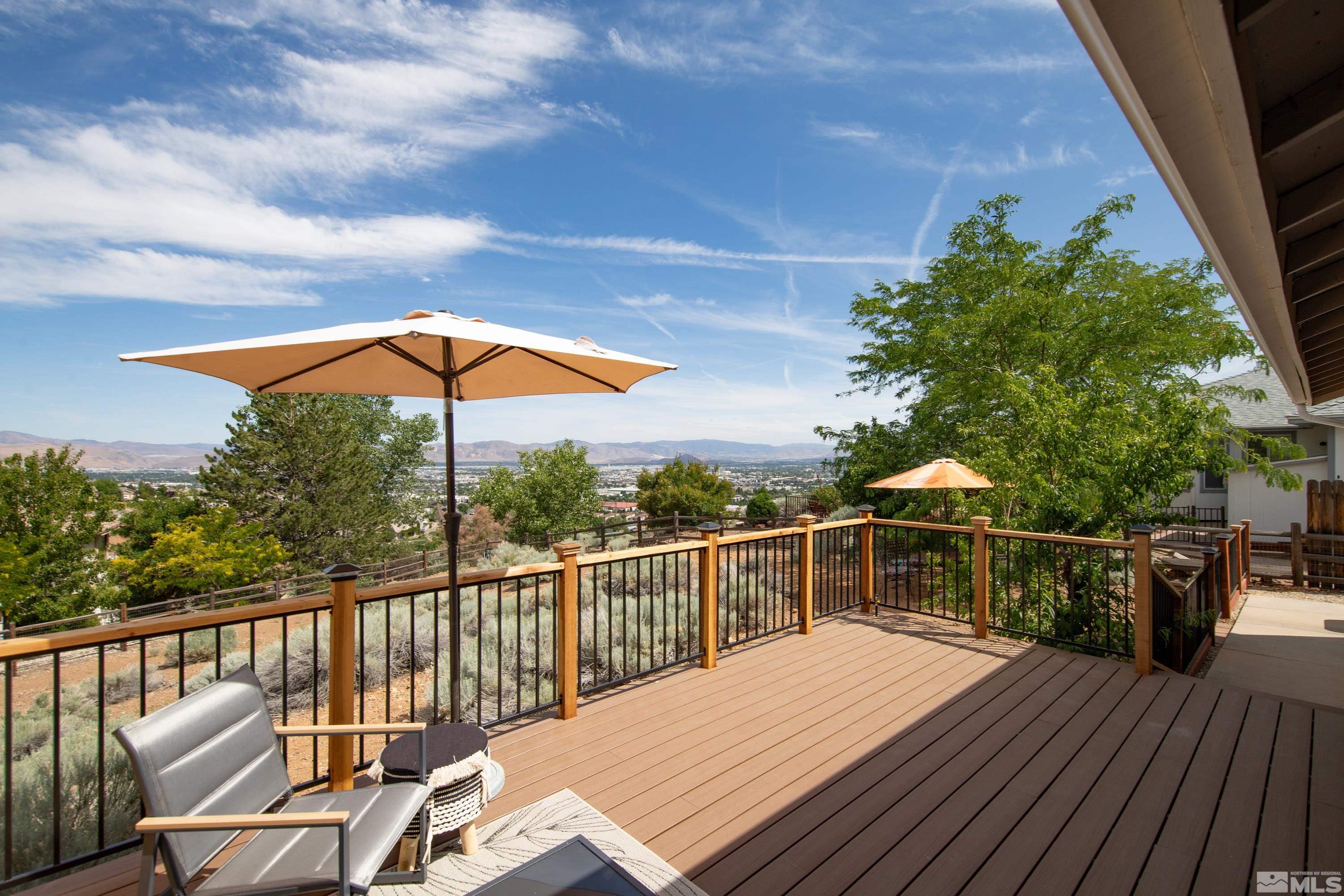 962 University Ridge Court Reno, NV 89512 - Photo 2 of 40 a view of a balcony with furniture