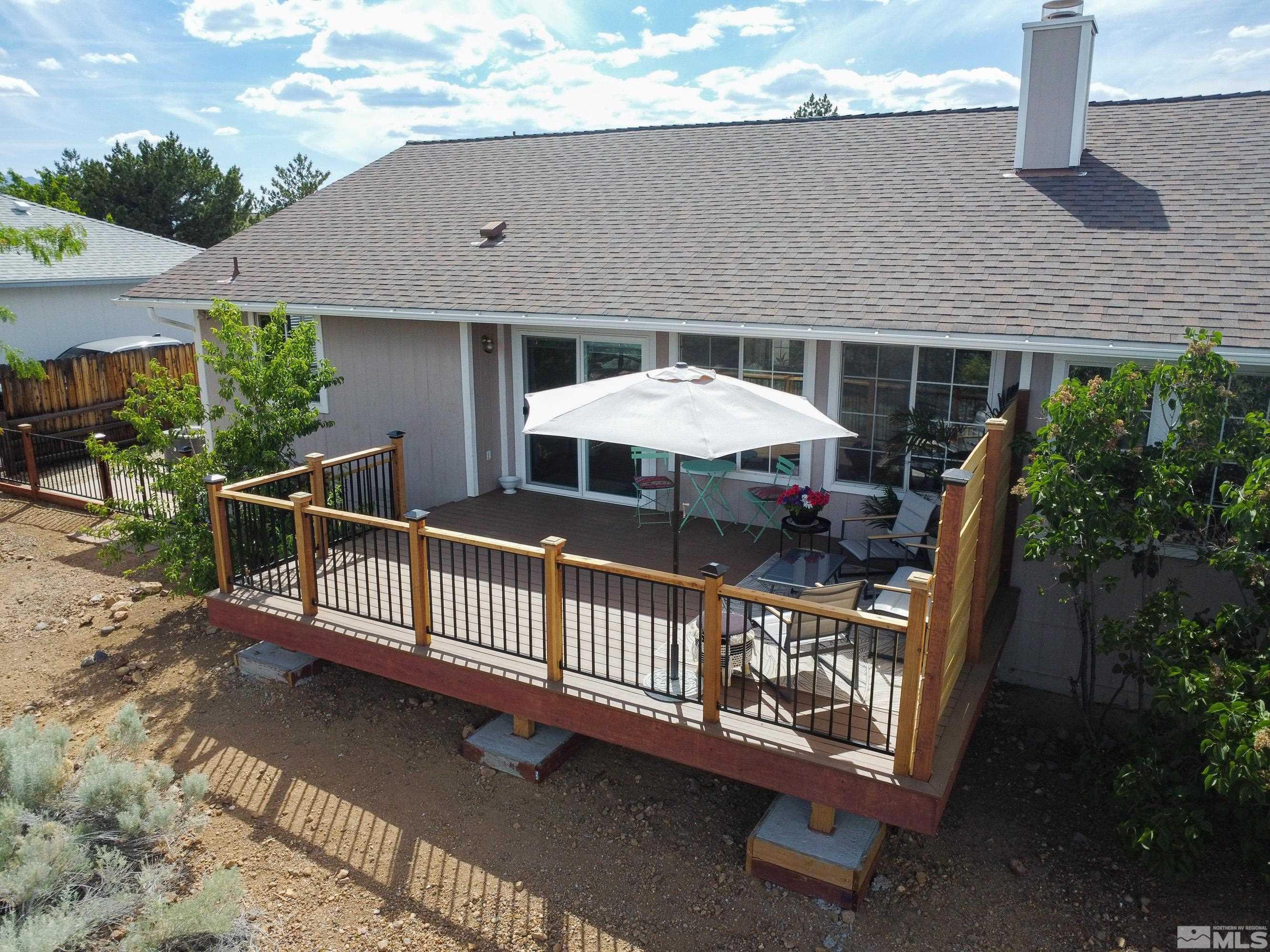 962 University Ridge Court Reno, NV 89512 - Photo 25 of 40 a front view of a house with patio