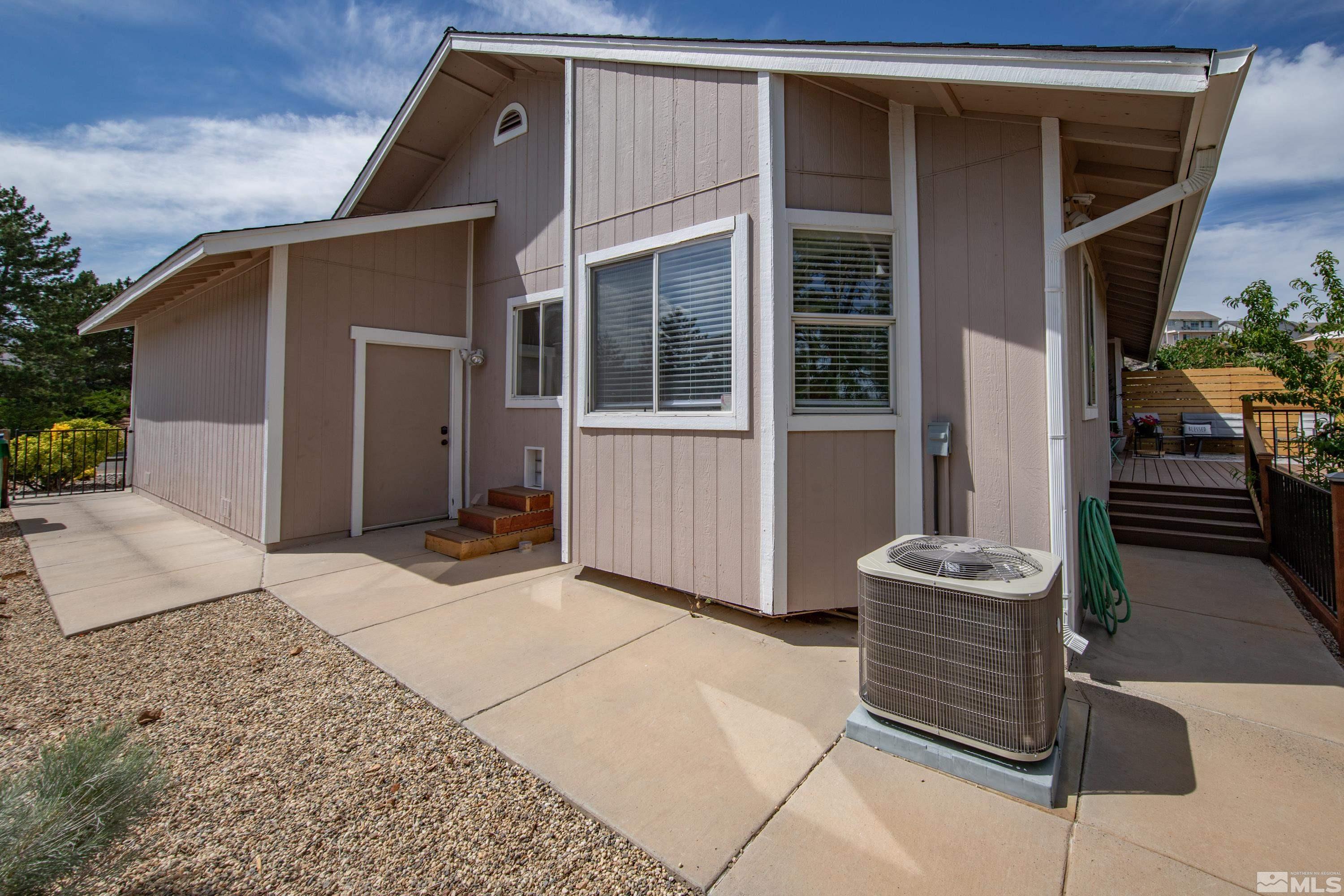 962 University Ridge Court Reno, NV 89512 - Photo 27 of 40 a front view of a house with garden