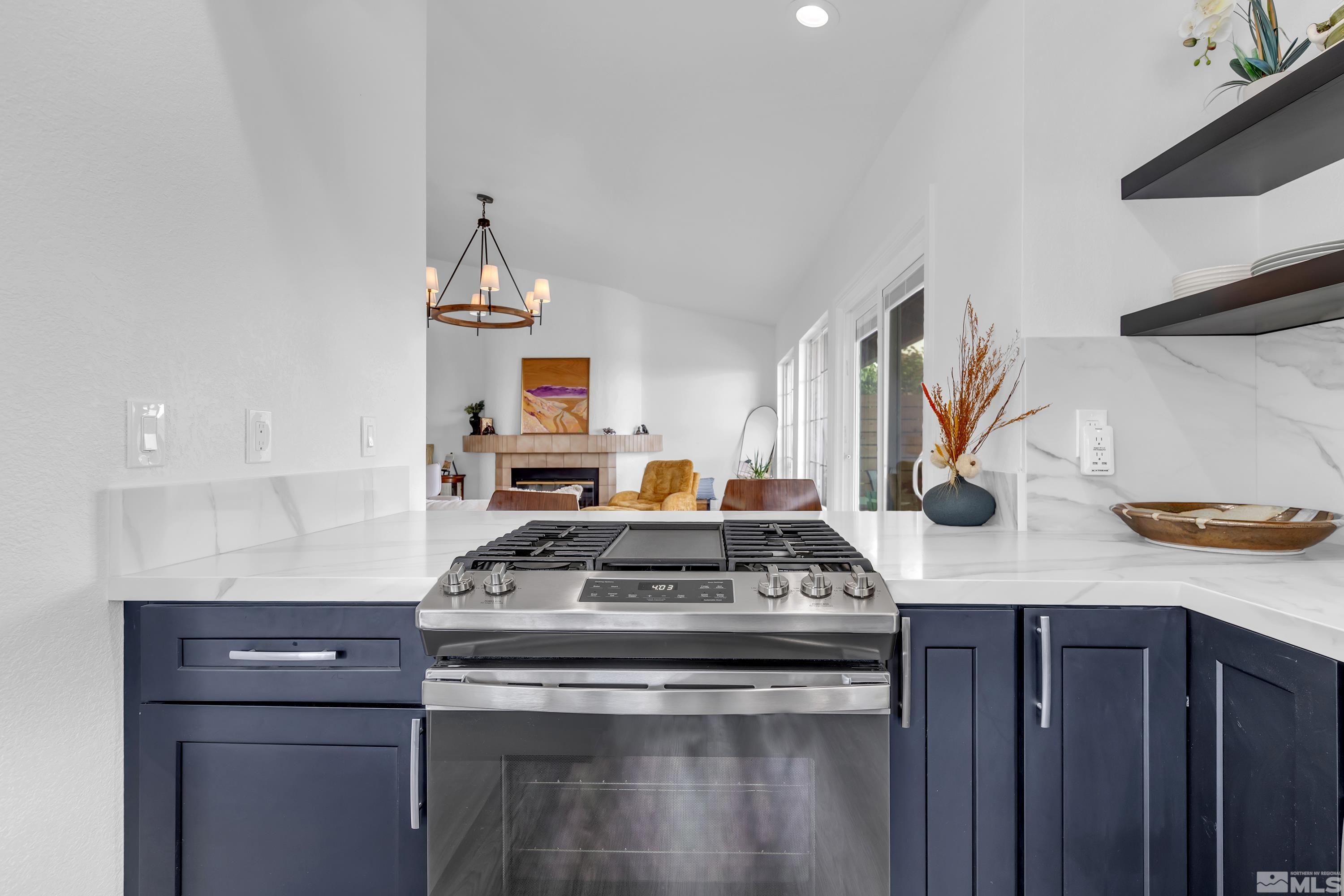 962 University Ridge Court Reno, NV 89512 - Photo 36 of 40 a stove top oven sitting inside of a kitchen