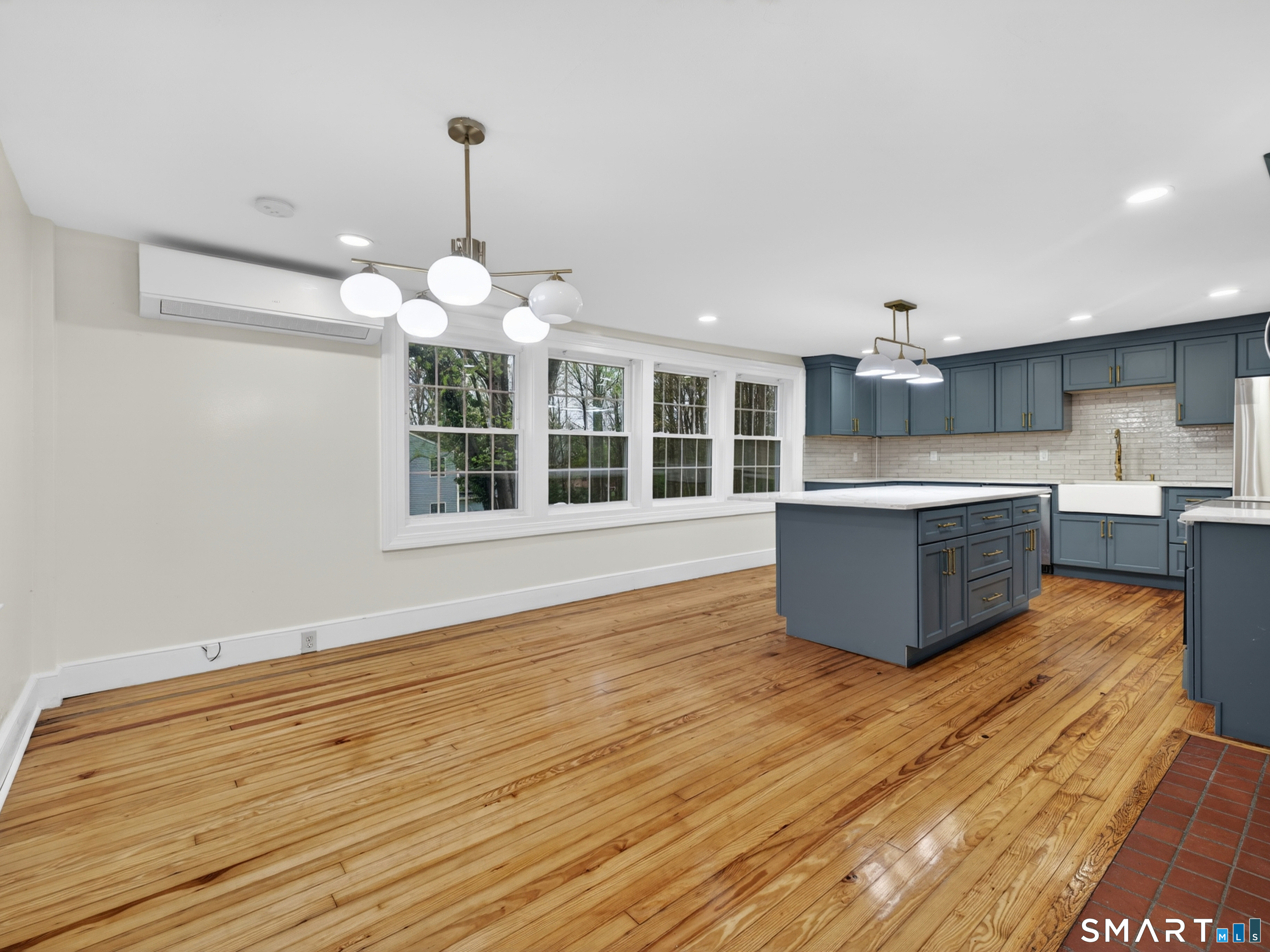 380 Main Street Meriden, CT 06451 - Photo 11 of 40 a view of a kitchen with microwave and cabinets