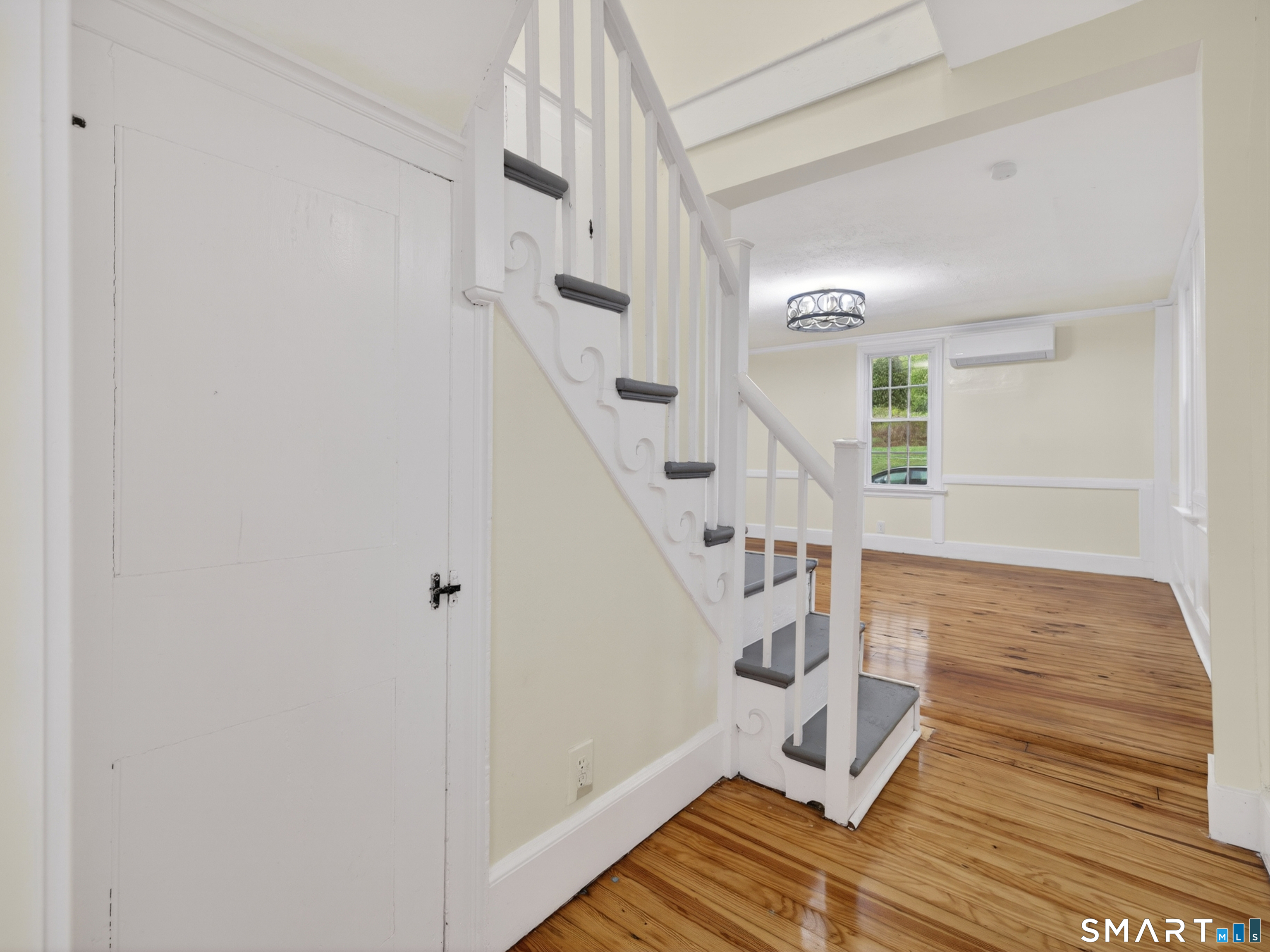 380 Main Street Meriden, CT 06451 - Photo 12 of 40 a view of entryway with wooden floor
