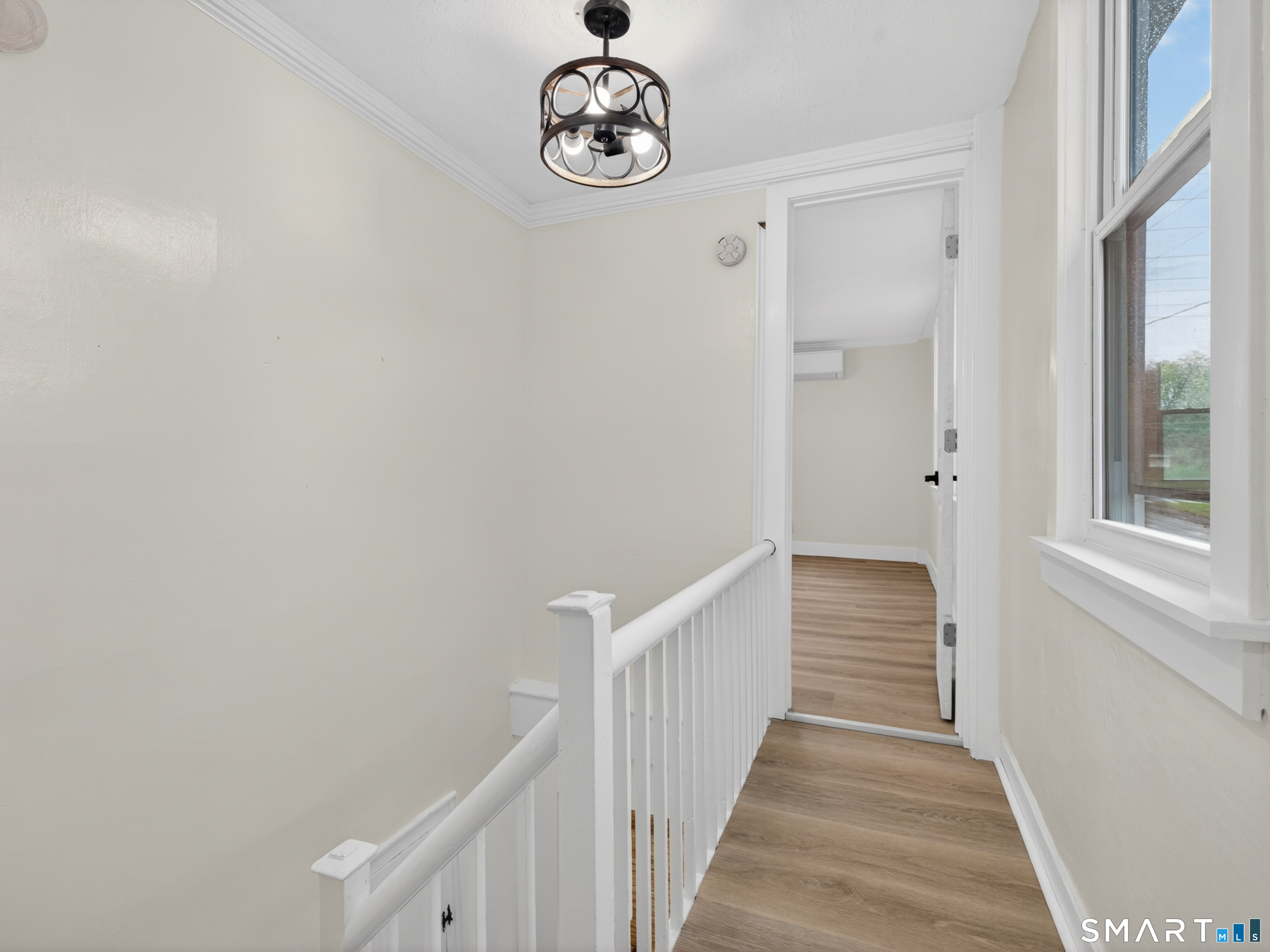 380 Main Street Meriden, CT 06451 - Photo 20 of 40 a view of a hallway with wooden floor
