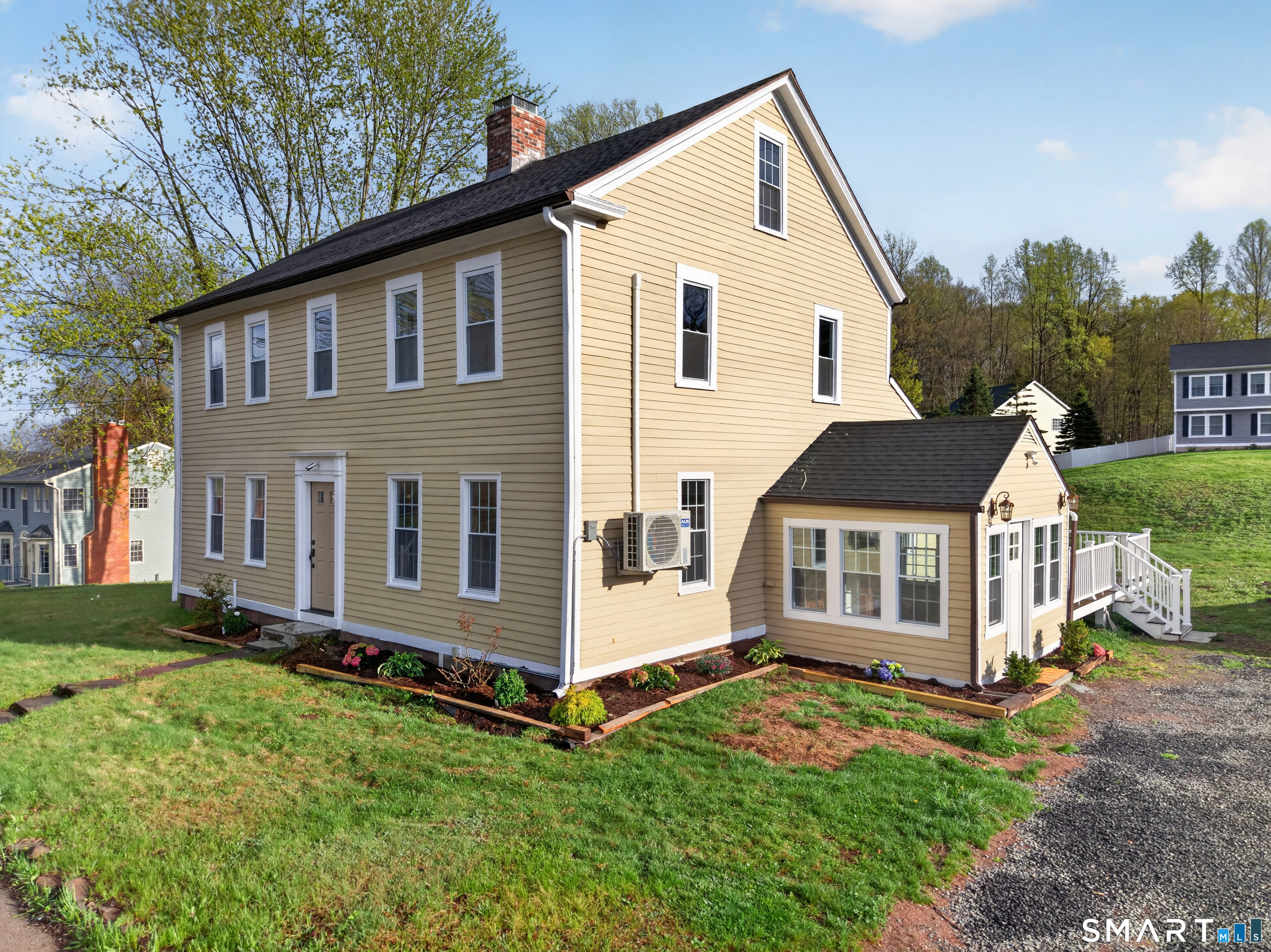 380 Main Street Meriden, CT 06451 - Photo 2 of 40 a view of a back yard of the house