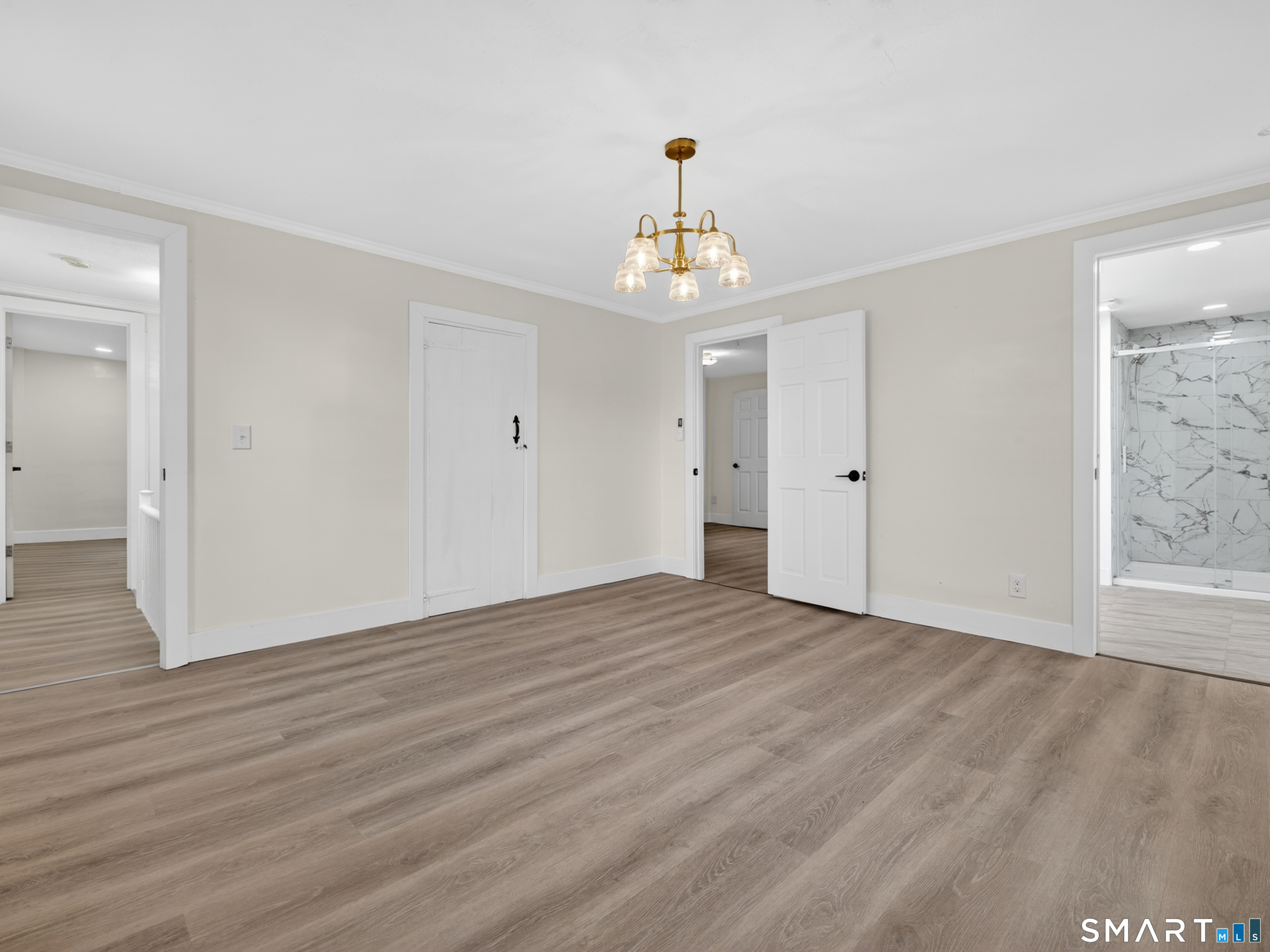 380 Main Street Meriden, CT 06451 - Photo 30 of 40 a view of an empty room with wooden floor and a window